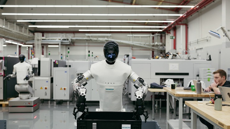 Humanoide Roboter von HMND im Industrieeinsatz bei Siemens — um genau solche Arbeitsplätze kreist die Debatte Quelle: Hu